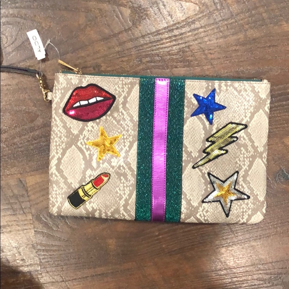 Snake print/sequin patch clutch!